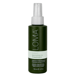 Bottle of Loma Light Nourishing Oil Treatment 8oz