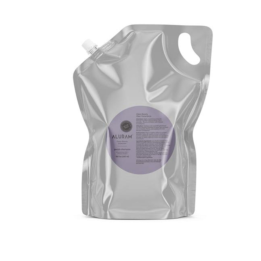 Bottle of Aluram Purple Shampooo 100oz Pouch