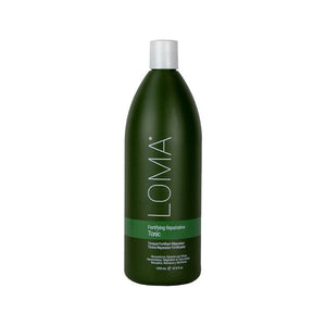 Bottle of Loma Nourishing Oil Treatment 33.8oz